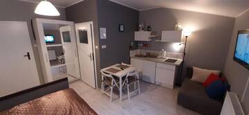Фото номера Номер-студио с балконом Апартаменты Apartament Słoneczna г. Radzyń 5